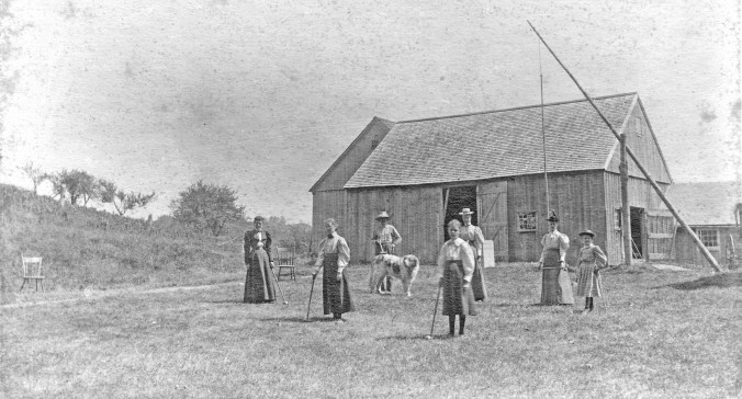 Playing Croquet in side yard
